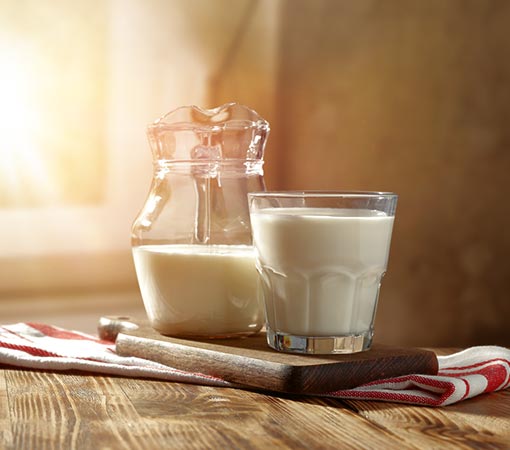 Laktoseintoleranz - Michkanne und Glas